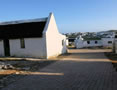 View from the top of the road back towards the centre of Arniston. — at Waenhuiskrans/Arniston.
